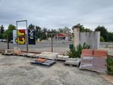 a parking lot with a lot of bricks and a lot of cement