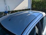 a car that is parked in front of a house