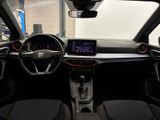 the interior of a small car with a steering wheel and dashboard