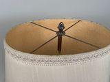 an image of a lamp shade with a wooden handle