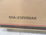 a cardboard box with a black and red stripe on it