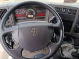 the dashboard of a car with a steering wheel and dashboard controls