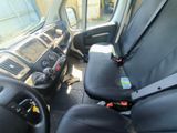 a black seat in the back of a truck