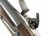 a close up of a rifle on a white background with a white background