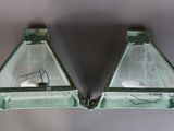 une paire d'appliques murales en verre vert suspendues au plafond