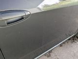 a close up of a car door handle and door handle