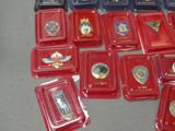 a lot of red trays with badges on them