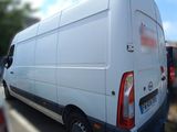 a white van parked on the side of the road