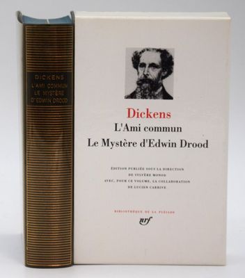 two books sitting next to each other on a white surface