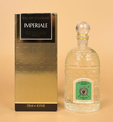 an image of a bottle of imperial cologne next to a box