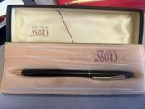 a pen that is sitting in a box on a table