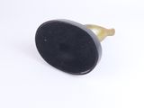 an image of a close up of a black knob on a white surface