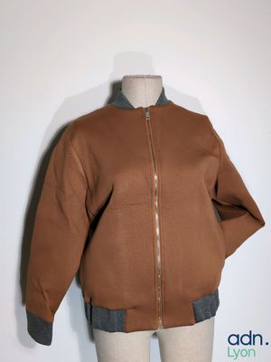 an image of a brown jacket on a mannequin mannequin mannequin mannequin mannequin mannequin mannequin mannequin
