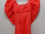an image of a red dress hanging on a white hanger