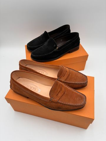 TOD’S – Paire de mocassins noir et marron. Taille : 37. État d'us...