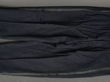 an old pair of pants sitting on top of a table