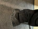 a person that is standing on a skateboard on the floor