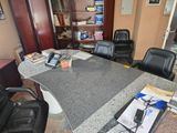a desk that has a phone on top of it