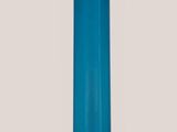a blue glass vase with a gold top on a table