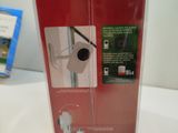 a red box with a picture of a birdhouse inside of it