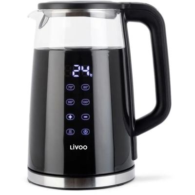 un gros plan d'une cafetière sur laquelle figure une horloge numérique