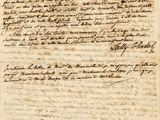 une lettre écrite à l'encre noire sur une feuille de papier