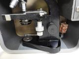 a microscope that is sitting inside of a box