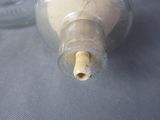 a bottle that has a cork in it on a table