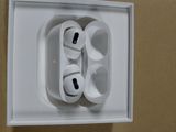 a picture of an apple airpods in a white box