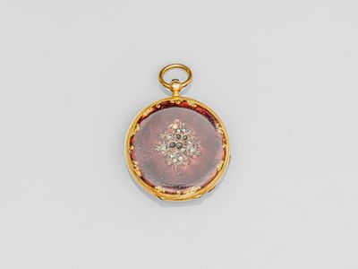 une image représentant un cadenas doré contenant une fleur rouge et blanche