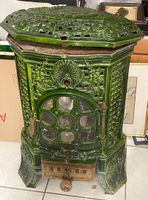 Poêle en fonte émaillé époque 1900 modèle LILY, DEVILLE à CH…