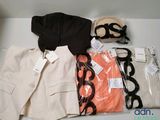 a pile of clothing that is sitting on a table