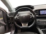 the interior of a car with a steering wheel, dashboard, and dash board