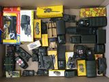 a box full of toy trains and other toys in it