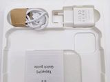 a white box with a charger and a charger attached to it