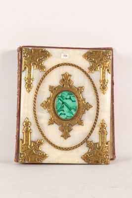 an antique picture frame with a picture of a woman in a frame