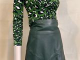 green leopard print top and black leather mini skirt