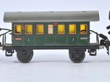 three toy trains that are sitting side by side