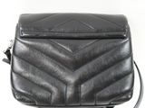 black leather cross body bag with chevroned design on strap