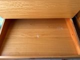a drawer that has a book in it
