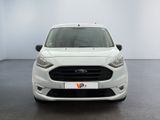 the front of a white ford transit van parked in a white room