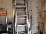 a ladder leaning up against a wall in a garage