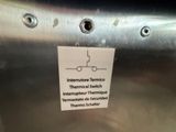 a label on the side of a stainless steel oven