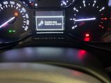 the dashboard of a car with various gauges and speedometers