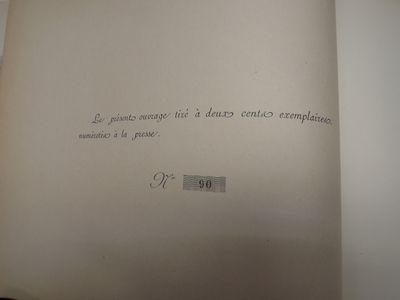 an open book with writing on it on a table