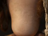 a close up view of a doll ' s feet and feet