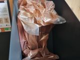 a plastic bag that is sitting inside of a trash can