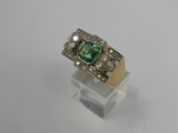 an emerald and diamond ring