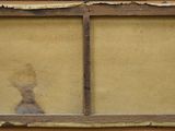 an old window with a broken glass in it