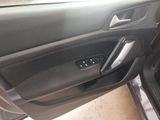 a picture of a car door handle with the door handle open